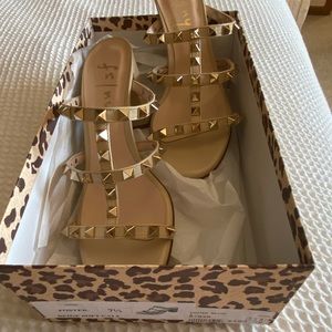 Beautiful sandals. Worn twice.  Beige with gold studs